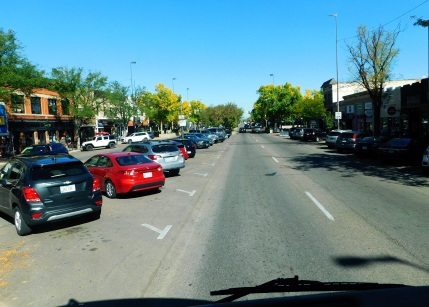 Driving through the town of Fort Collins. They have old fashioned middle of the street parking. Strange.